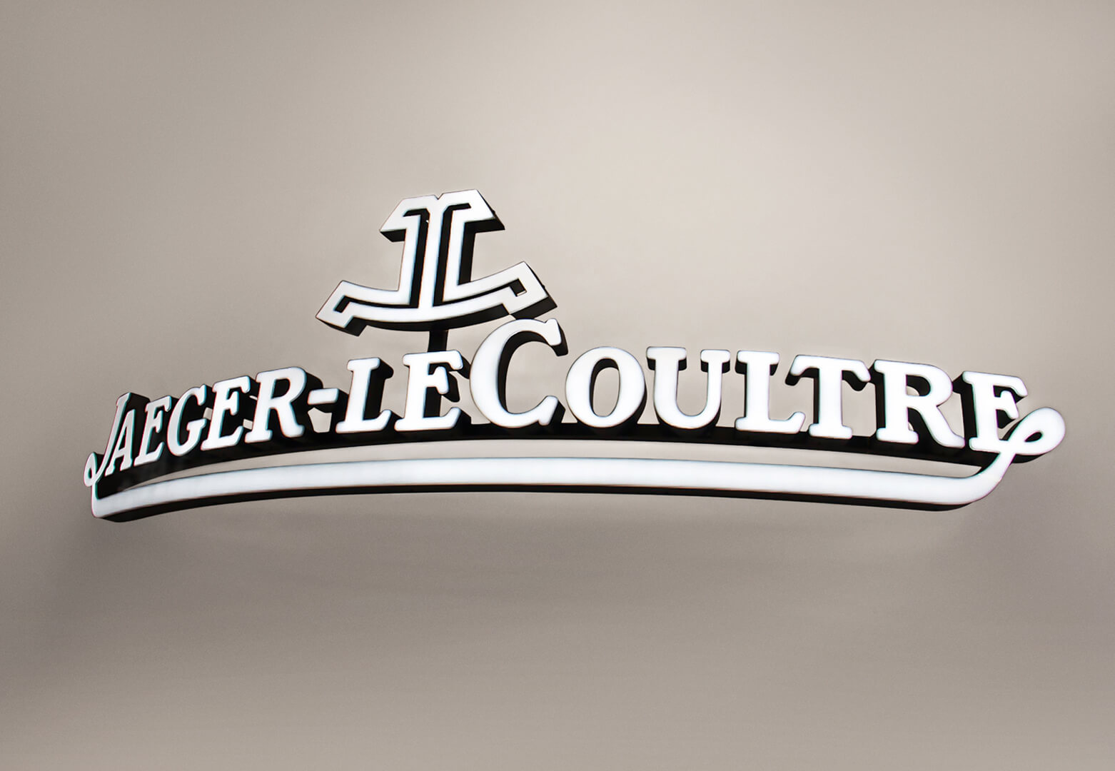 Jaeger-LeCoultre - logo ad arco, illuminato frontalmente in bianco